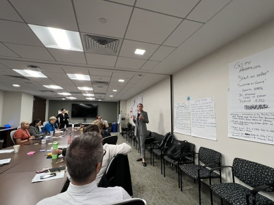 Tricia Light presenting in an office